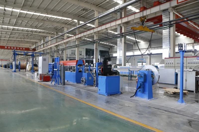 Cable production line with extruder, cooling trough and haul-off