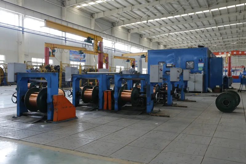 Copper wire bunching line with wire pay-off drums in the cable workshop