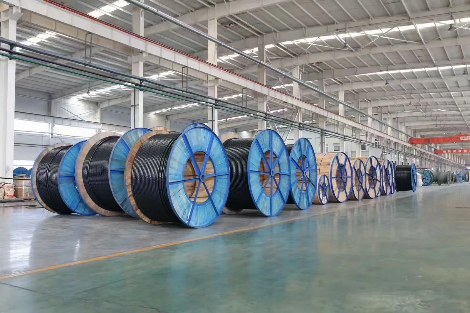 Large cable drums stored in the workshop