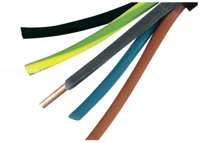 Several flexible wires with rubber insulation in black, green, blue, brown and green-and-yellow, stripped at the ends